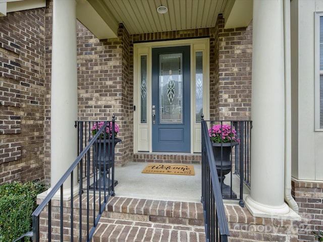 property entrance featuring a porch