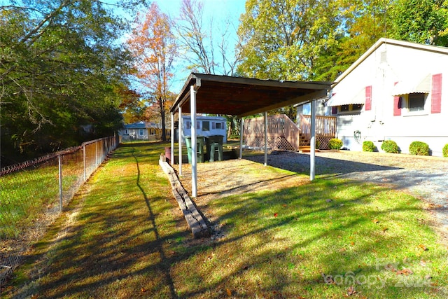 view of yard with a carport