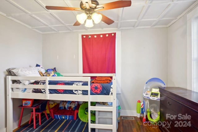 bedroom with wood-type flooring and ceiling fan