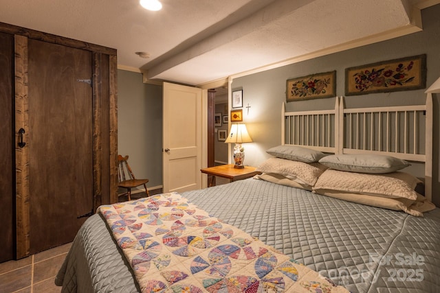 bedroom with ornamental molding