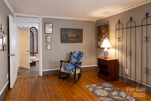 unfurnished room with dark wood-type flooring and ornamental molding