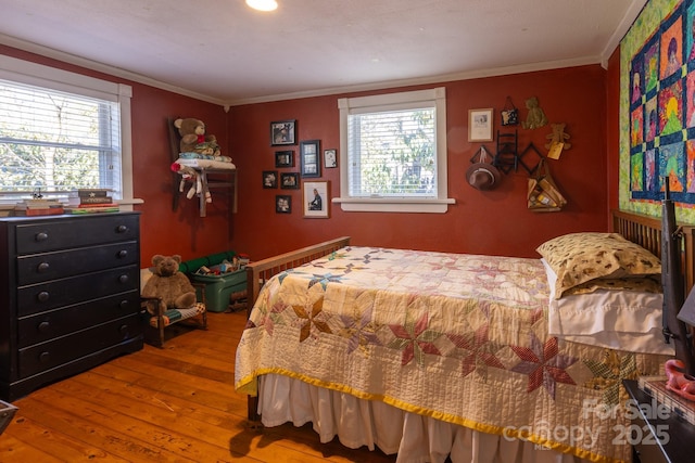 26 Kitazuma Rd, Black Mountain, NC 28711 - bedroom featuring hardwood / wood-style floors, multiple windows, and ornamental molding