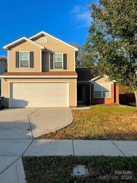 front of property featuring a garage