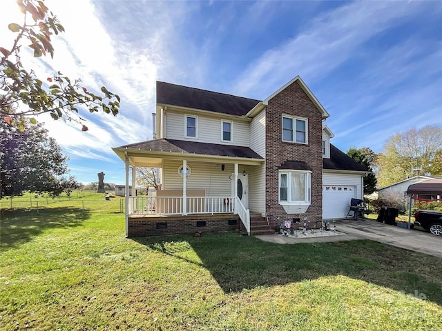 view of front facade with a front lawn, a porch, and a carport