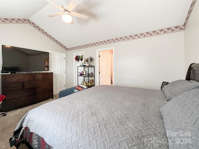 bedroom with ceiling fan, light carpet, and lofted ceiling