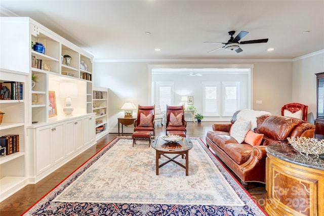 living area with dark wood finished floors, recessed lighting, a ceiling fan, and crown molding