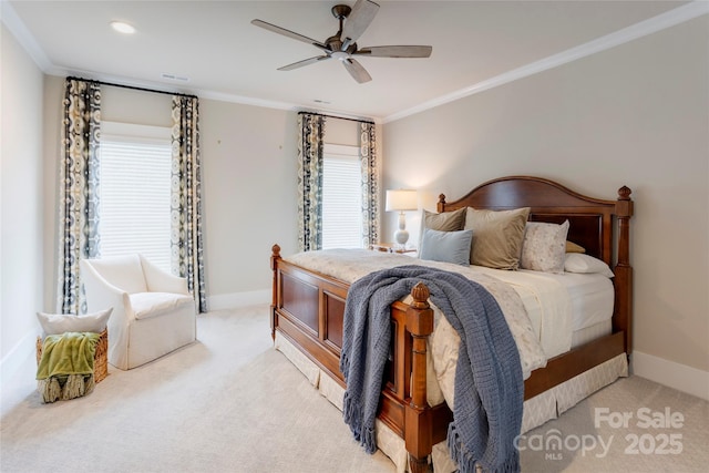 bedroom featuring ornamental molding, light carpet, and baseboards