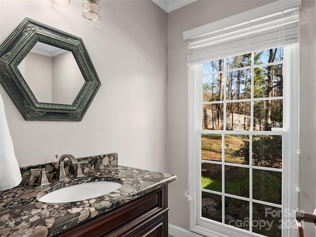 bathroom featuring vanity and crown molding