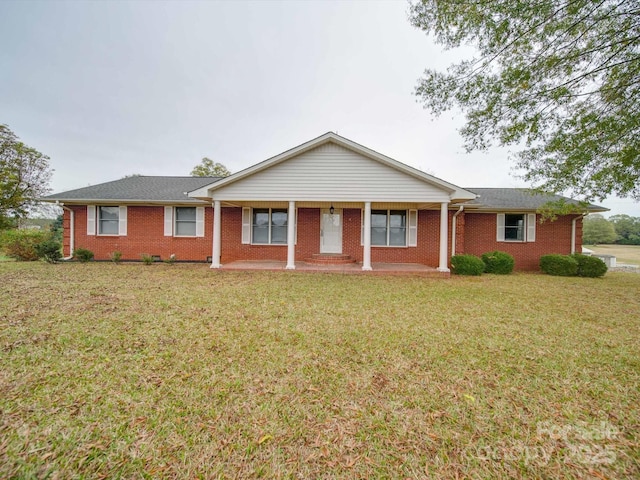 single story home with a front yard