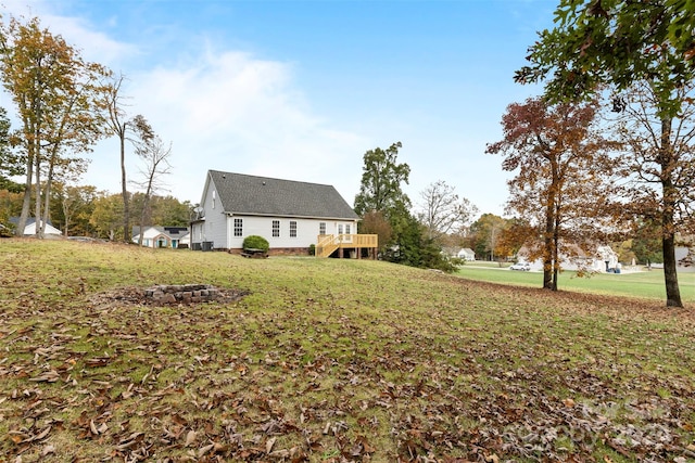 view of yard featuring a wooden deck