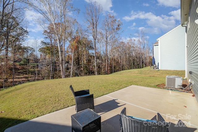 view of yard featuring a patio area and cooling unit