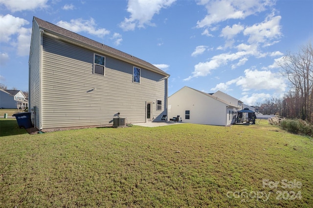 back of house featuring a gazebo, a yard, a patio, and central air condition unit