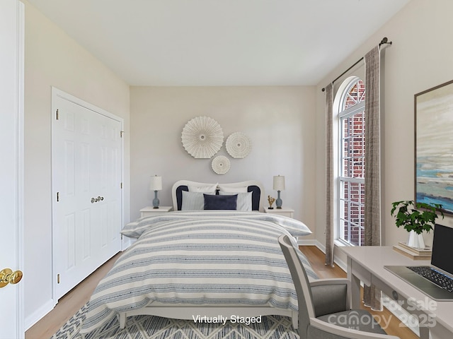 bedroom featuring hardwood / wood-style floors