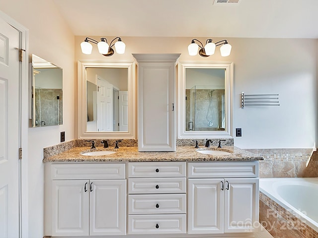 bathroom with vanity and plus walk in shower