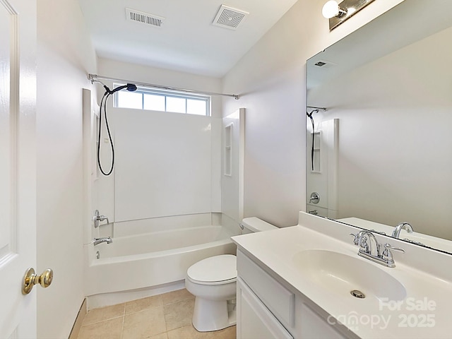 full bathroom with toilet, vanity, tile patterned floors, and tub / shower combination