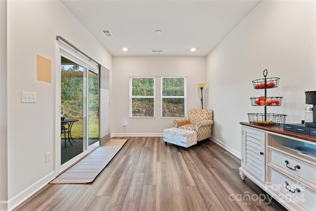 sitting room featuring hardwood / wood-style flooring