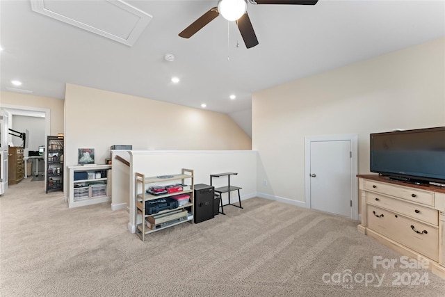 miscellaneous room with light carpet, ceiling fan, and lofted ceiling