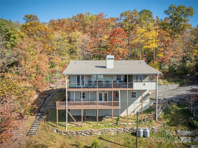 rear view of house with a balcony