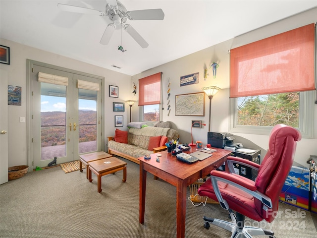 carpeted office featuring ceiling fan and french doors