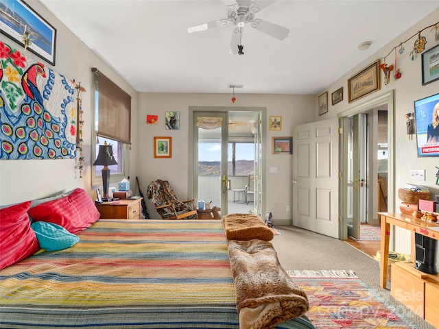 bedroom featuring ceiling fan, carpet flooring, and access to exterior