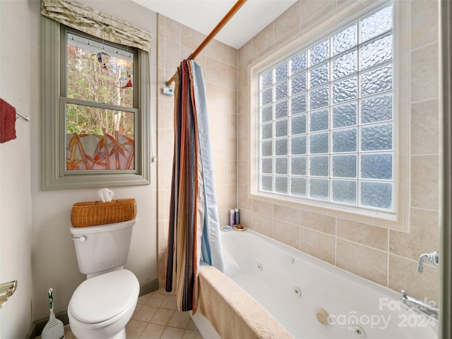 bathroom with toilet, shower / bath combo with shower curtain, and tile patterned flooring