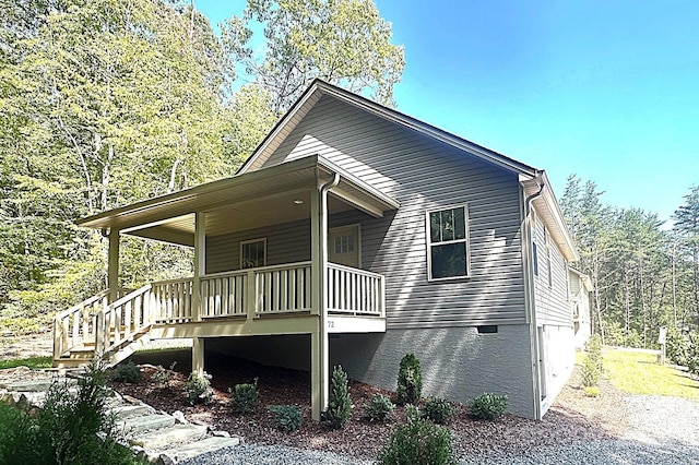 view of home's exterior with covered porch