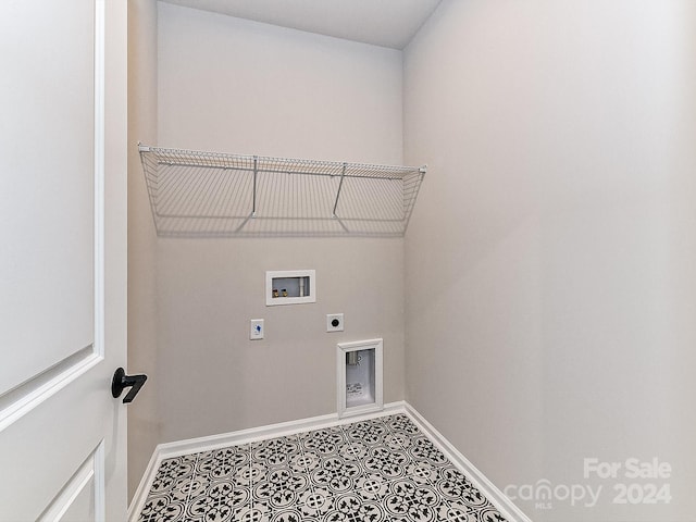 laundry area featuring tile patterned floors, hookup for a washing machine, and hookup for an electric dryer