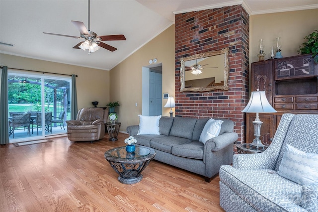 living room with ceiling fan, wood-type flooring, crown molding, and vaulted ceiling