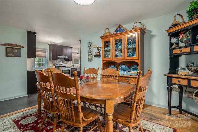 dining room with hardwood / wood-style floors