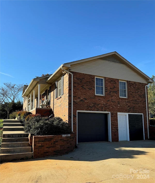 view of home's exterior featuring a garage