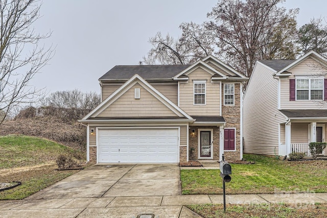 view of front facade featuring a front lawn and a garage