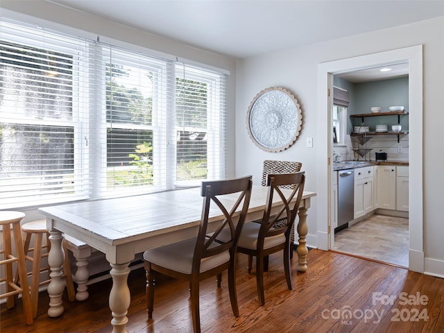 dining room with light wood-type flooring