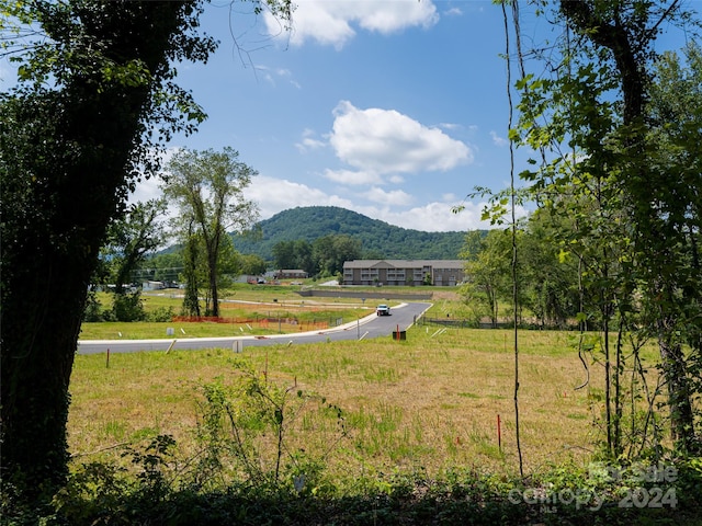 view of mountain feature with a rural view