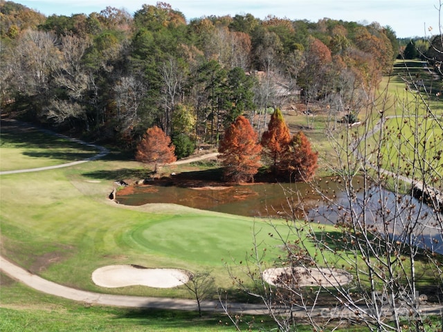 surrounding community with a water view