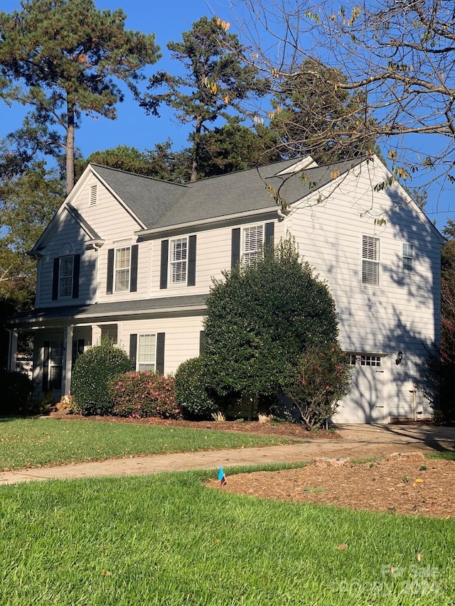 view of home's exterior with a yard