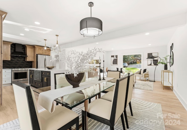 dining area with light hardwood / wood-style flooring