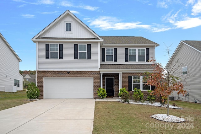 front facade with a garage, a front yard, and central AC