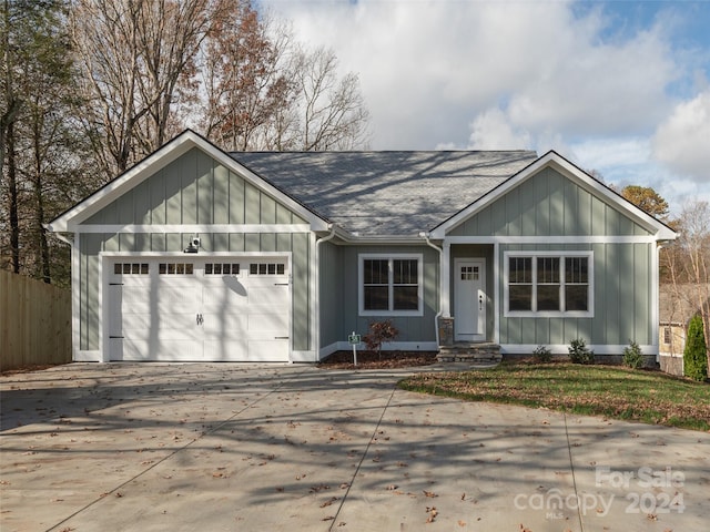 view of front of property featuring a garage