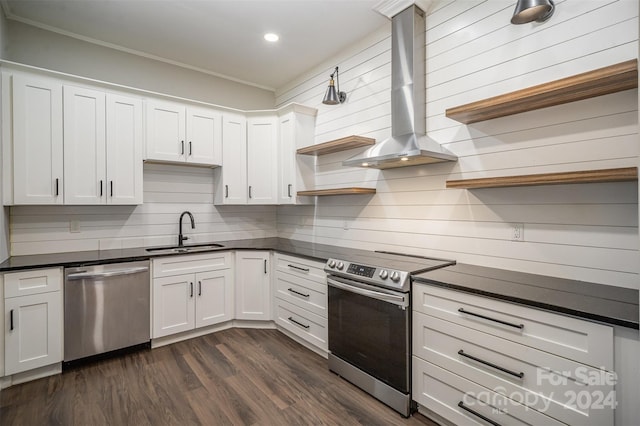 kitchen featuring white cabinetry, stainless steel appliances, dark wood-type flooring, and sink