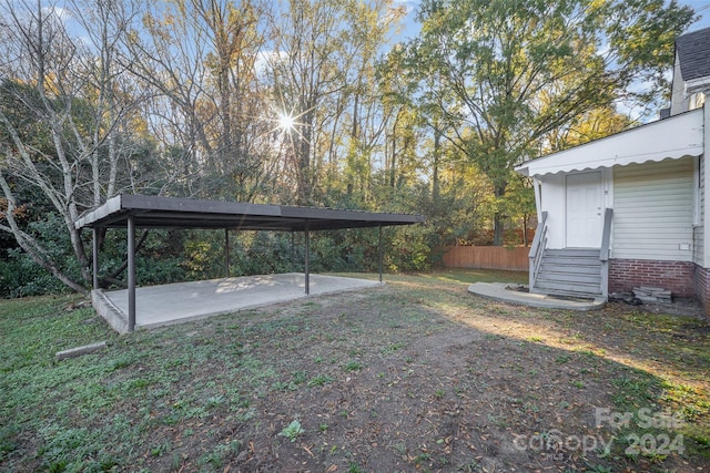 view of yard with a carport