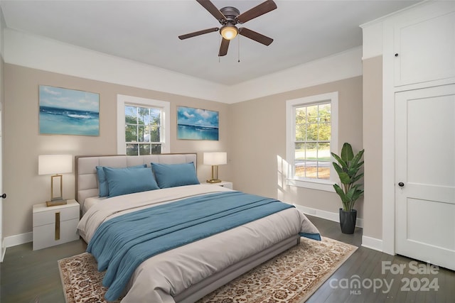 bedroom featuring dark wood-type flooring and ceiling fan