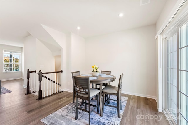 dining area featuring hardwood / wood-style floors