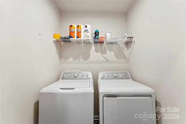 laundry room with washer and dryer