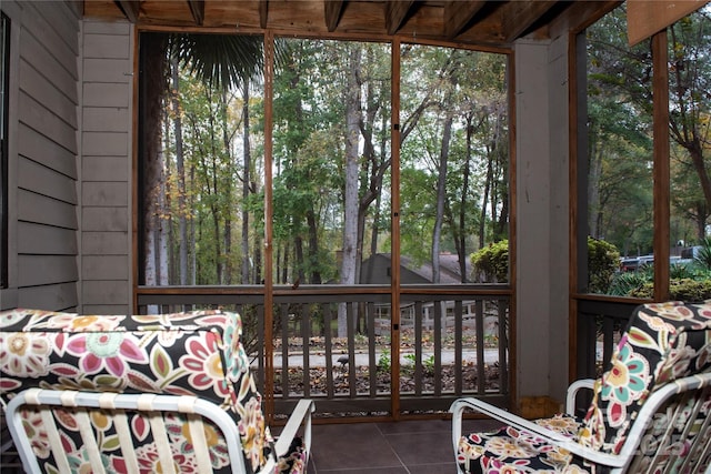 unfurnished sunroom featuring a healthy amount of sunlight