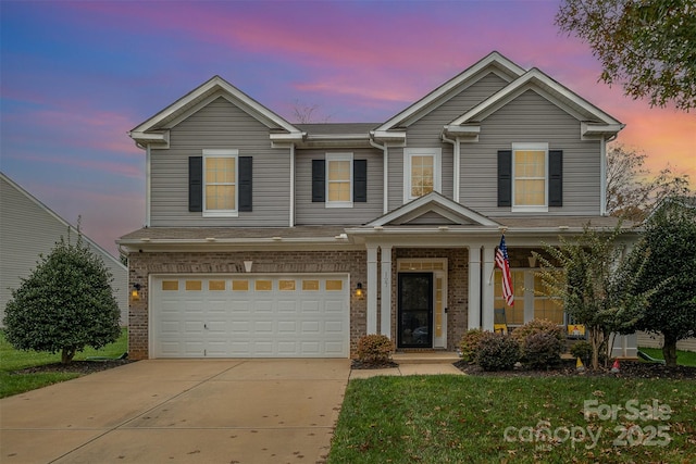 view of front of property with a garage