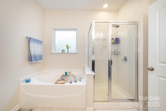 bathroom with plus walk in shower and tile patterned floors