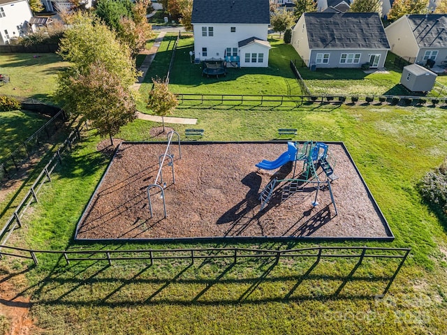 exterior space featuring a yard and a playground