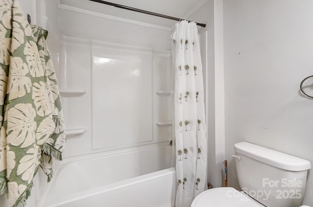 bathroom featuring toilet and shower / tub combo with curtain