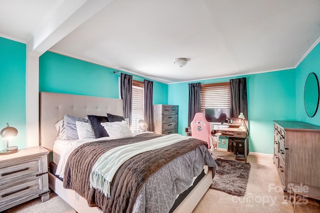 carpeted bedroom with crown molding