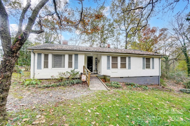 view of front of home featuring a front yard